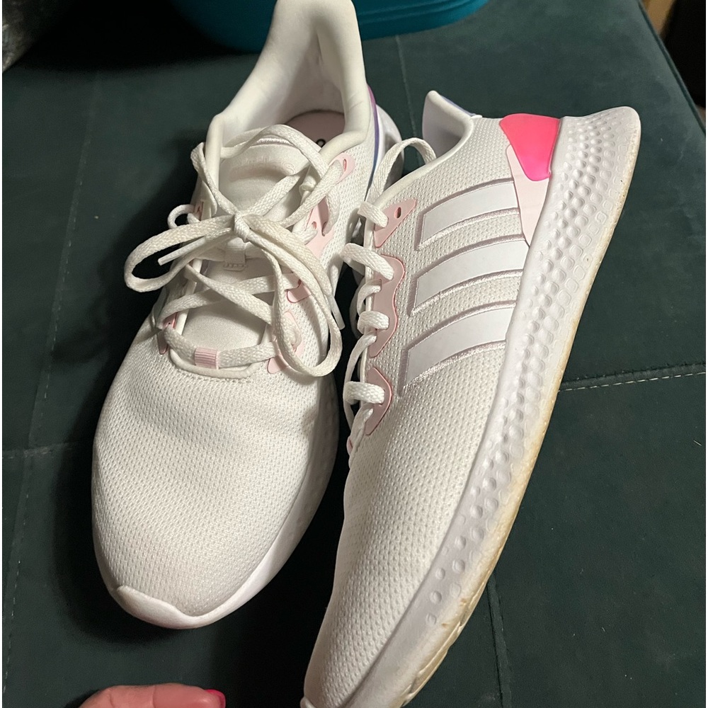 Adidas tennis shoes.